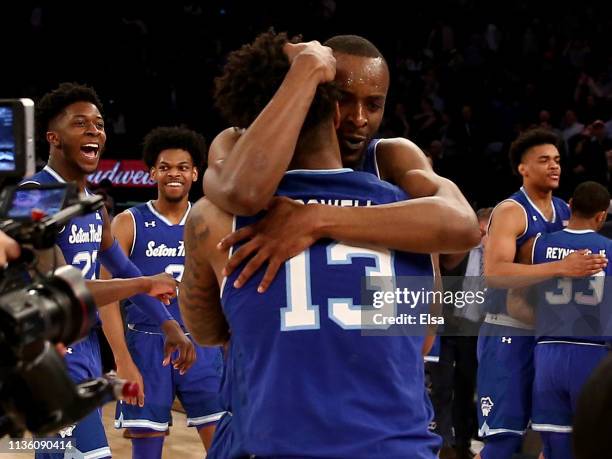 Quincy McKnight of the Seton Hall Pirates celebrates the win with teammate Myles Powell after the game against the Marquette Golden Eagles during the...