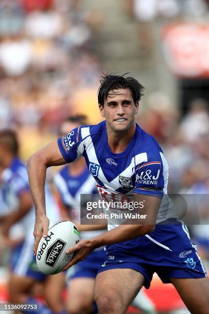 Lachlan Lewis of the Bulldogs passes during the round 1 NRL match between the New Zealand Warriors and the Canterbury Bulldogs at Mt Smart Stadium on...