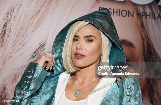 Professional wrestler C.J. Perry arrives at the GENLUX Issue Release Party hosted by Kristin Cavallari and Carly Steel on March 15, 2019 in Beverly...