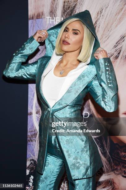 Professional wrestler C.J. Perry arrives at the GENLUX Issue Release Party hosted by Kristin Cavallari and Carly Steel on March 15, 2019 in Beverly...