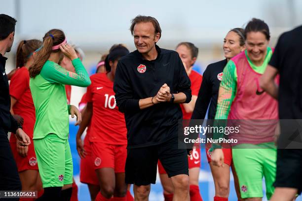 Kenneth Heiner-Moller of Canada celebrates victory whit him players after the international friendly match between Canada W and Nigeria W at Pinatar...