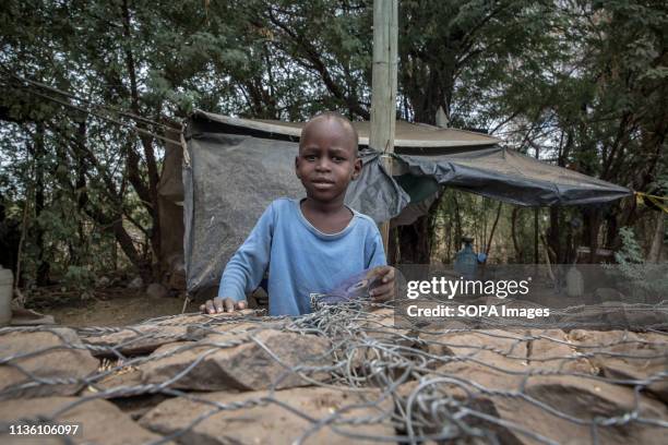 Child seen in Kakuma refugee camp, northwest Kenya. Kakuma is home to members of the local Turkana community and the nearby refugee camps shelter...