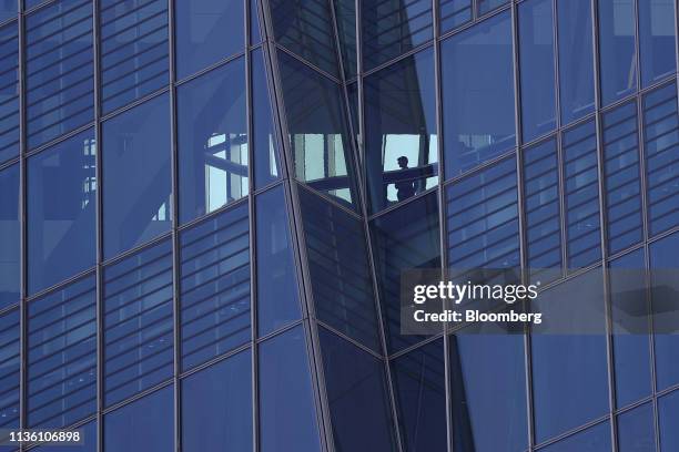 Worker stands inside an office inside the European Central Bank headquarters in Frankfurt, Germany, on Wednesday, April 10, 2019. The ECB's policy...