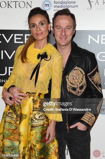 Wilma Helena Faissol and Francesco Facchinetti are seen on red carpet of Never Give Up Onlus on March 15, 2019 in Milan, Italy.