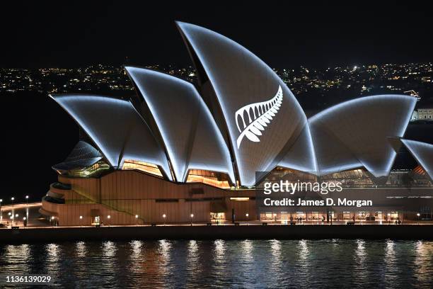 Silver fern is projected onto the sails of the Opera House in commemoration of the victims of the Christchurch massacre on March 16, 2019 in Sydney,...