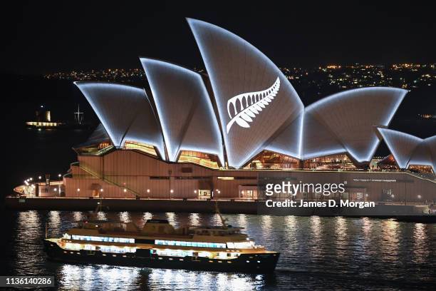 Silver fern is projected onto the sails of the Opera House in commemoration of the victims of the Christchurch massacre on March 16, 2019 in Sydney,...