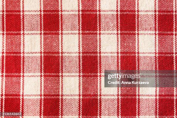 textile background with a checkered red napkin, top view. natural textile background. fabric texture background. texture of natural linen fabric. - la casa imagens e fotografias de stock