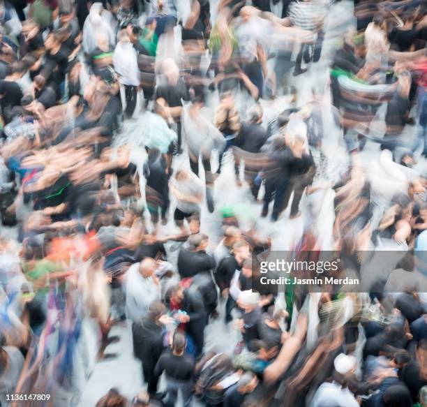 crowded people motion on street - commuters overhead view stock pictures, royalty-free photos & images