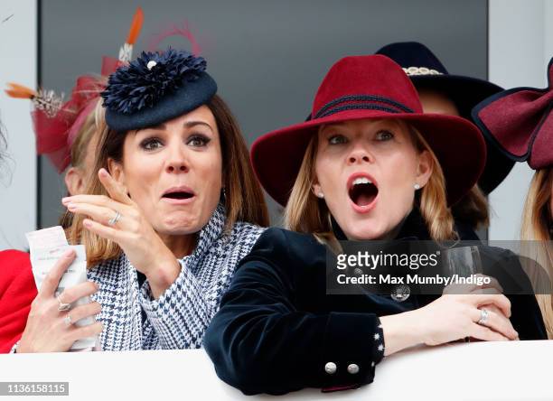 Natalie Pinkham and Autumn Phillips watch the racing as they attend day 4 'Gold Cup Day' of the Cheltenham Festival at Cheltenham Racecourse on March...