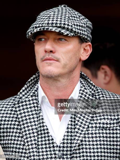 Luke Evans watches the racing as he attends day 4 'Gold Cup Day' of the Cheltenham Festival at Cheltenham Racecourse on March 15, 2019 in Cheltenham,...