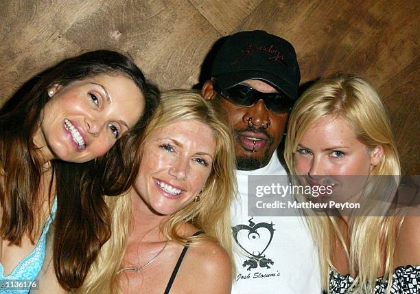 Model Alicia Rickter, model Brandy Roderick, Basketball player Dennis Rodman and actress Gena Lee Nolin pose during the pre-party for "Celebrity...