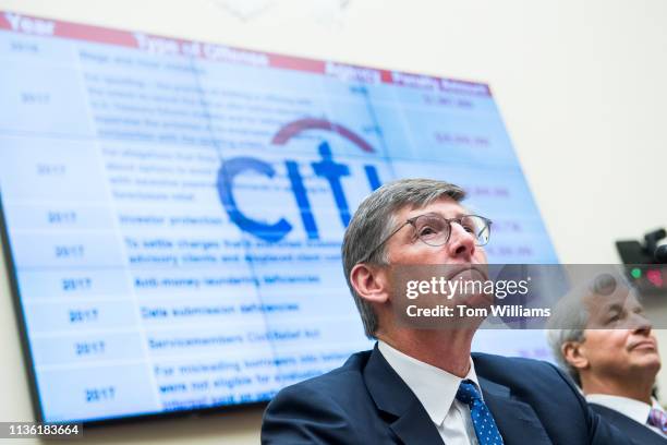 RUNITED STATES Michael Corbat, left, CEO of Citigroup, and Jamie Dimon, CEO of JPMorgan Chase, testify during a House Financial Services Committee...