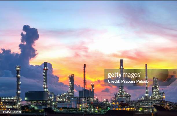 gas turbine electrical power plant at dusk with twilight - carbon cycle stock-fotos und bilder