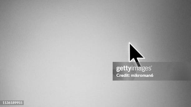 close-up of cursor on computer monitor - cursor-pointer stock pictures, royalty-free photos & images