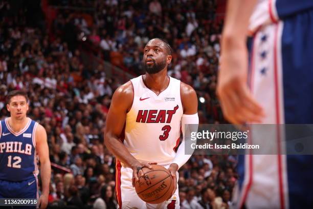 Dwyane Wade of the Miami Heat shoots a free throw during the game against the Philadelphia 76ers on April 9, 2019 at American Airlines Arena in...