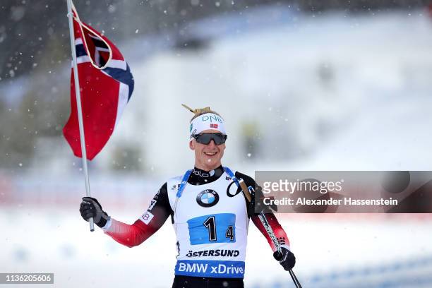 Johannes Thingnes Boe of Norway celebrates at the finish line winning the IBU Biathlon World Championships Men's Relay at Swedish National Biathlon...