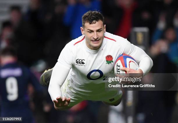 Jonny May of England scores his team's fourth try during the Guinness Six Nations match between England and Scotland at Twickenham Stadium on March...