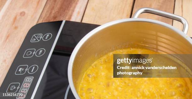 turmeric latte preparation - high density lipoprotein stock pictures, royalty-free photos & images