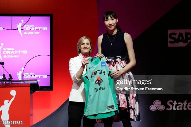 Christy Hedgpeth poses with Han Xu after being drafted by the New York Liberty during the 2019 WNBA Draft on April 10, 2019 at Nike New York...