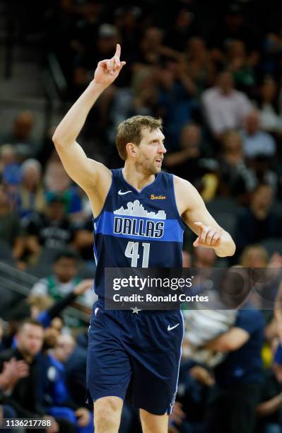 Dirk Nowitzki of the Dallas Mavericks celebrates a score against the San Antonio Spurs at AT&T Center on April 10, 2019 in San Antonio, Texas. NOTE...