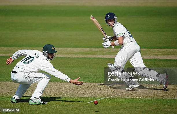 Joe Root of Yorkshire hits out during the LV County Championship match between Nottinghamshire and Yorkshire at Trent Bridge on May 4, 2011 in...