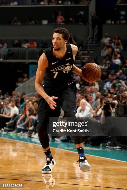 Michael Carter-Williams of the Orlando Magic handles the ball during the game against the Charlotte Hornets on April 10, 2019 at Spectrum Center in...