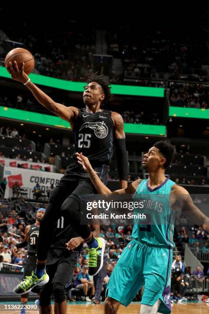 Wes Iwundu of the Orlando Magic shoots the ball during the game against the Charlotte Hornets on April 10, 2019 at Spectrum Center in Charlotte,...