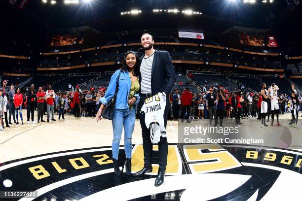 Miles Plumlee of the Atlanta Hawks gives his jersey away to a fan after the game against the Indiana Pacers on April 10, 2019 at State Farm Arena in...