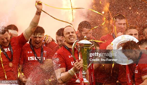 Wales captain Alun Wyn Jones and team mates celebrate with the Championship trophy after their Grand Slam win after the Guinness Six Nations match...