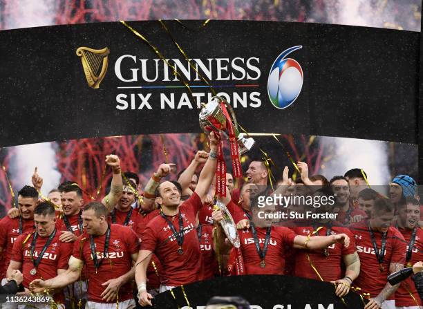 Wales captain Alun Wyn Jones and team mates celebrate with the Championship trophy after their Grand Slam win after the Guinness Six Nations match...