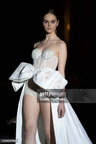 Model with a CABURE Hugo Vazquez design during the MADRID BRIDAL FASHION WEEK show in Madrid, Spain. April 10, 2019