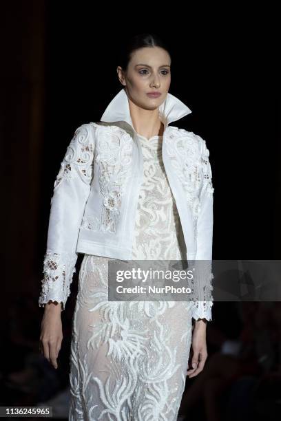 Model with a CABURE Hugo Vazquez design during the MADRID BRIDAL FASHION WEEK show in Madrid, Spain. April 10, 2019