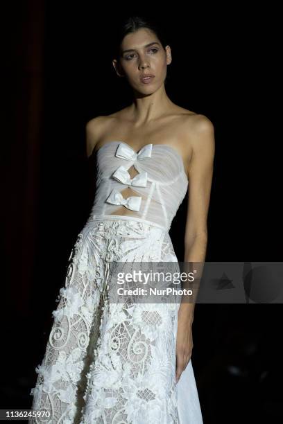 Model with a CABURE Hugo Vazquez design during the MADRID BRIDAL FASHION WEEK show in Madrid, Spain. April 10, 2019