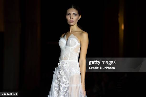 Model with a CABURE Hugo Vazquez design during the MADRID BRIDAL FASHION WEEK show in Madrid, Spain. April 10, 2019