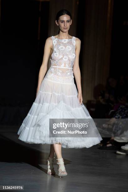 Model with a CABURE Hugo Vazquez design during the MADRID BRIDAL FASHION WEEK show in Madrid, Spain. April 10, 2019