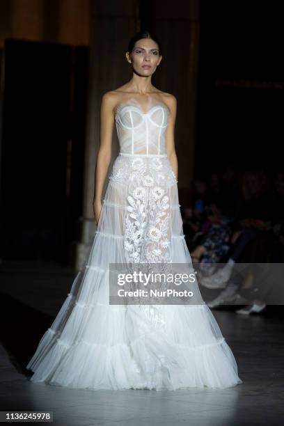 Model with a CABURE Hugo Vazquez design during the MADRID BRIDAL FASHION WEEK show in Madrid, Spain. April 10, 2019