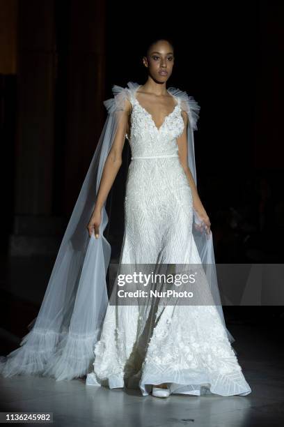 Model with a CABURE Hugo Vazquez design during the MADRID BRIDAL FASHION WEEK show in Madrid, Spain. April 10, 2019