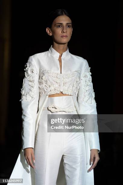 Model with a CABURE Hugo Vazquez design during the MADRID BRIDAL FASHION WEEK show in Madrid, Spain. April 10, 2019