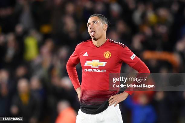 Chris Smalling of Manchester United reacts following defeat in the FA Cup Quarter Final match between Wolverhampton Wanderers and Manchester United...