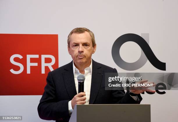 President of the French telecommunication group SFR-Altice France Alain Weill talks during a press conference to present Altice France 2019 prospects...