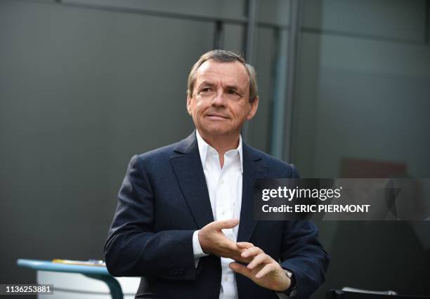 President of the French telecommunication group SFR-Altice France Alain Weill poses for a picture prior to a press conference to present Altice...