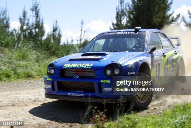 Tommi Makinen of Finland takes a corner in his Subaru Impreza WRC on stage 23 of the Propecia Rally New Zealand, 06 October 2002 near Maramarua....