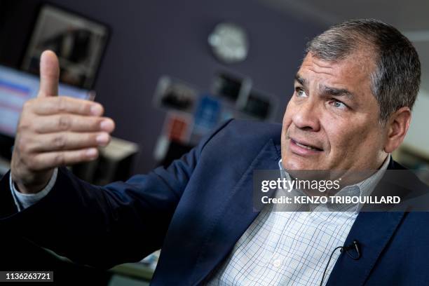 Ecuador's former President Rafael Correa gestures during an interview with Agence France-Presse in Brussels on April 11, 2019 after WikiLeaks founder...