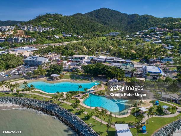 aerial view of airlie beach lagoon and main street of airlie beach,queensland,australia - lord howe island stockfoto's en -beelden