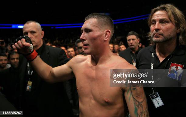 Darren Till acknowledges the fans as he walks out of the ring looking dejected after losing his Welterweight bout to Jorge Masvidal at The O2 Arena...