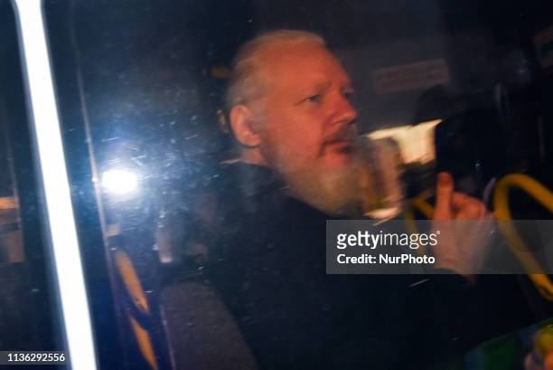 Wikileaks founder Julian Assange makes his way into the Westminster Magistrates Court after being arrested this morning by Metropolitan Police, on...
