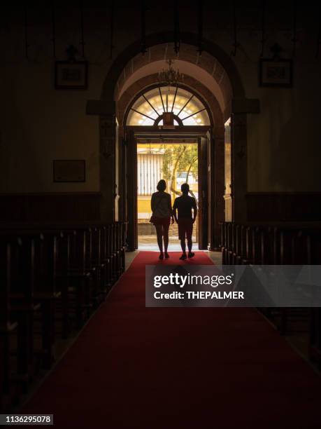 mother and son leaving church - leaving church stock pictures, royalty-free photos & images