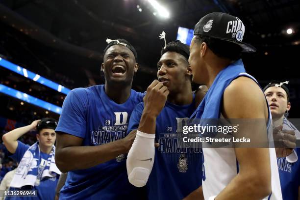 Teammates Zion Williamson, RJ Barrett, and Tre Jones of the Duke Blue Devils react after defeating the Florida State Seminoles 73-63 in the...