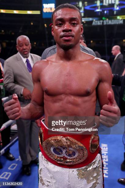 Errol Spence Jr celebrates in the ring after defeating Mikey Garcia in an IBF World Welterweight Championship bout at AT&T Stadium on March 16, 2019...