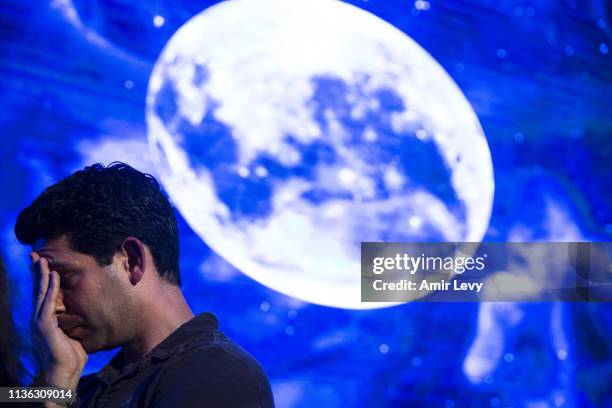 An Israeli man react after Beresheet spacecraft fails to land safely on the moon on April 11, 2019 in Tel Aviv, Israel. The Israeli spacecraft -...